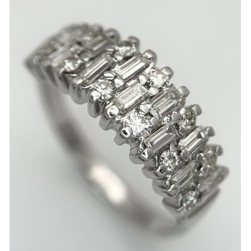111 - An 18K White Gold, Mixed Cut, Diamond Set Ring. 0.45ctw. 4.8g, Size M. SC 2060
