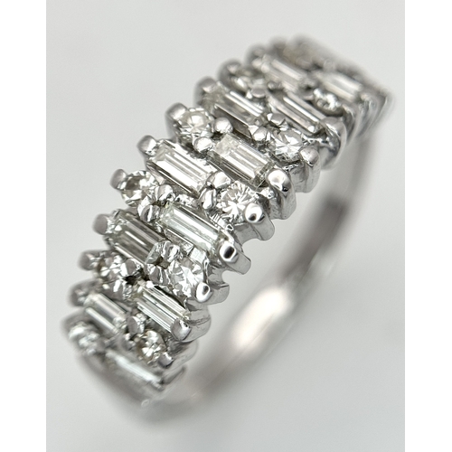 111 - An 18K White Gold, Mixed Cut, Diamond Set Ring. 0.45ctw. 4.8g, Size M. SC 2060