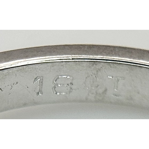 111 - An 18K White Gold, Mixed Cut, Diamond Set Ring. 0.45ctw. 4.8g, Size M. SC 2060