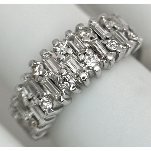 111 - An 18K White Gold, Mixed Cut, Diamond Set Ring. 0.45ctw. 4.8g, Size M. SC 2060