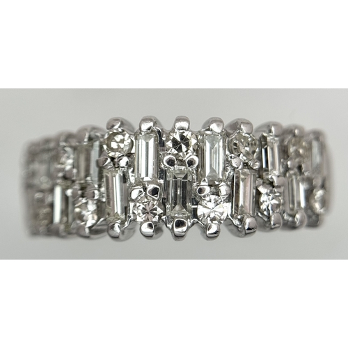111 - An 18K White Gold, Mixed Cut, Diamond Set Ring. 0.45ctw. 4.8g, Size M. SC 2060