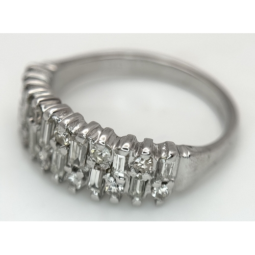 111 - An 18K White Gold, Mixed Cut, Diamond Set Ring. 0.45ctw. 4.8g, Size M. SC 2060