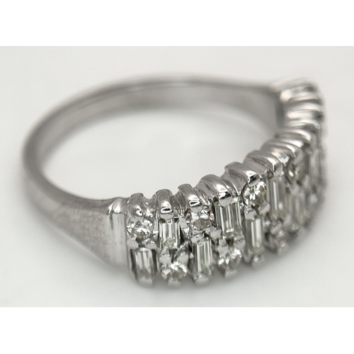111 - An 18K White Gold, Mixed Cut, Diamond Set Ring. 0.45ctw. 4.8g, Size M. SC 2060