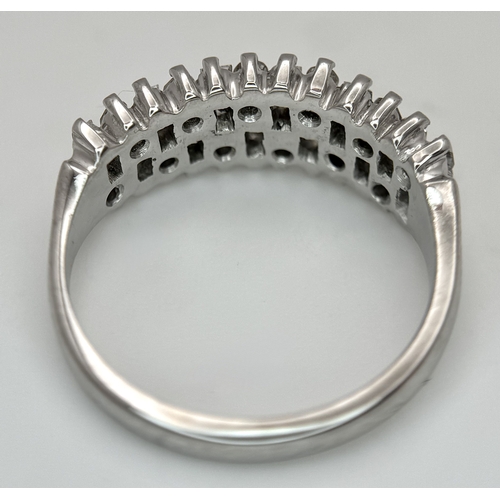 111 - An 18K White Gold, Mixed Cut, Diamond Set Ring. 0.45ctw. 4.8g, Size M. SC 2060
