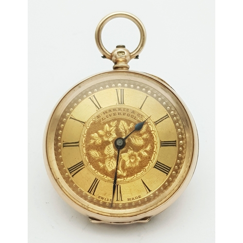 An Antique 14K Gold Cased E. Harrison of Liverpool Ladies Pocket Watch. Swiss movement. Gilded dial with black Roman Numeral markers. Finely engraved case with scrolling flowers and bouquet to centre. Comes with key. In working order but because of age no guarantees. 37mm diameter. 38g total weight.