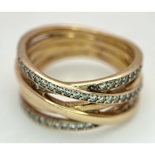 22 - A Pandora 14K Rose Gold (tests as) and Diamond Orbital Swirl Ring. 11mm at widest point. Circa 0.40c... 