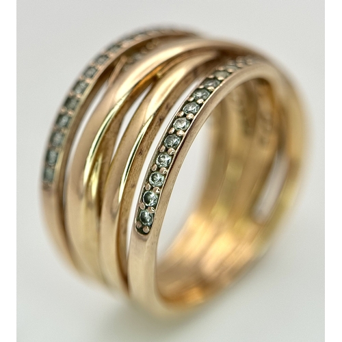 22 - A Pandora 14K Rose Gold (tests as) and Diamond Orbital Swirl Ring. 11mm at widest point. Circa 0.40c... 