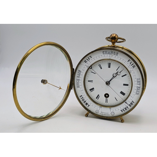 45 - An Antique Clock and Barometer in a Brass Drum Case. Most likely French, dating circa 1850. The oute... 