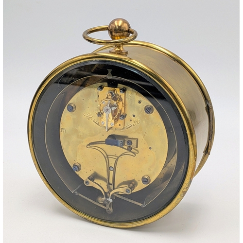 45 - An Antique Clock and Barometer in a Brass Drum Case. Most likely French, dating circa 1850. The oute... 