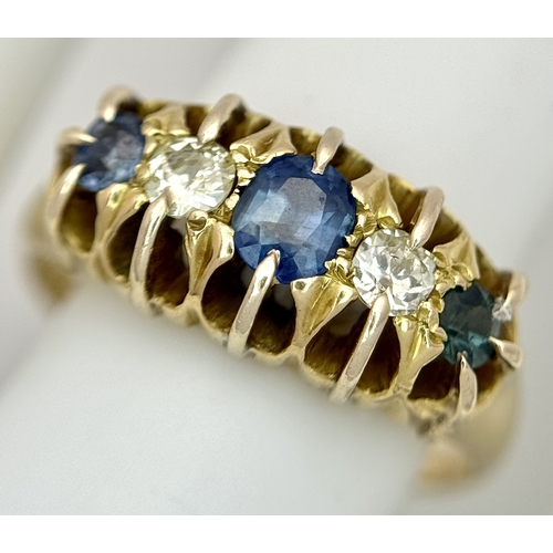 6 - An 18K Yellow Gold, Antique, Old Cut Diamond and Sapphire Ring. Hallmarked Birmingham 1918. 5.4g, Si... 