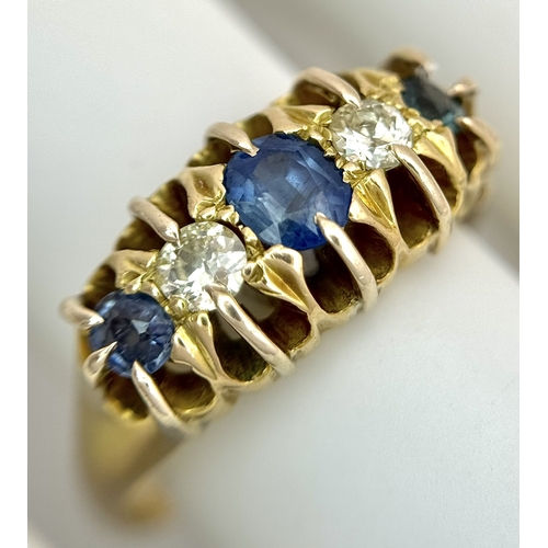 6 - An 18K Yellow Gold, Antique, Old Cut Diamond and Sapphire Ring. Hallmarked Birmingham 1918. 5.4g, Si... 