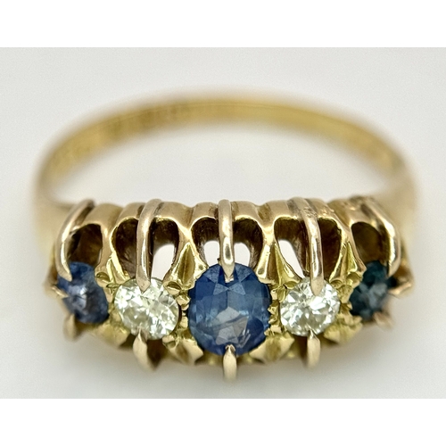 6 - An 18K Yellow Gold, Antique, Old Cut Diamond and Sapphire Ring. Hallmarked Birmingham 1918. 5.4g, Si... 