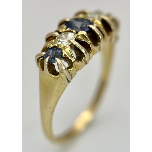 6 - An 18K Yellow Gold, Antique, Old Cut Diamond and Sapphire Ring. Hallmarked Birmingham 1918. 5.4g, Si... 
