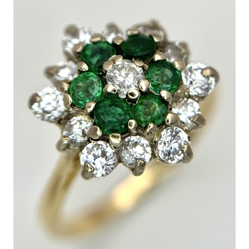 118 - An 18K Yellow Gold, Diamond and Emerald Cluster Ring. 0.50ctw. 3.8g, Size K. SC 2061