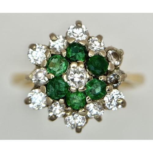 118 - An 18K Yellow Gold, Diamond and Emerald Cluster Ring. 0.50ctw. 3.8g, Size K. SC 2061