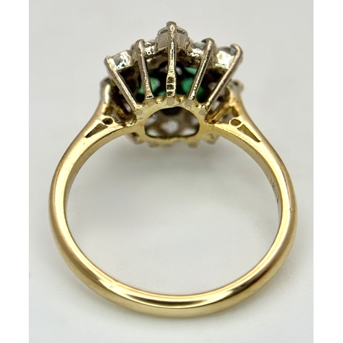 118 - An 18K Yellow Gold, Diamond and Emerald Cluster Ring. 0.50ctw. 3.8g, Size K. SC 2061