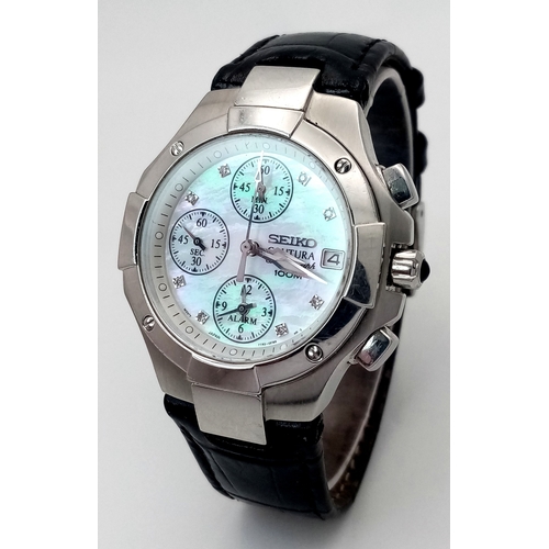 31 - A Rare Seiko Mother Of Pearl and Diamond Chronograph Quartz Ladies Watch. Model 7T62-OEMO. Black lea... 
