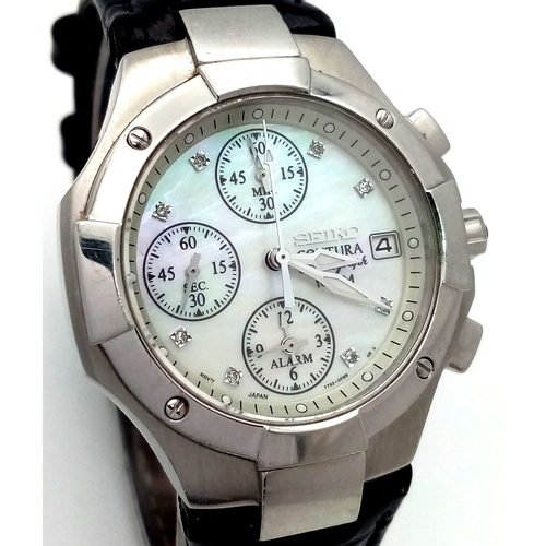 31 - A Rare Seiko Mother Of Pearl and Diamond Chronograph Quartz Ladies Watch. Model 7T62-OEMO. Black lea... 