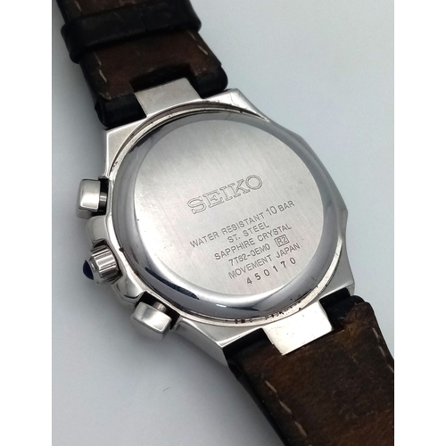 31 - A Rare Seiko Mother Of Pearl and Diamond Chronograph Quartz Ladies Watch. Model 7T62-OEMO. Black lea... 