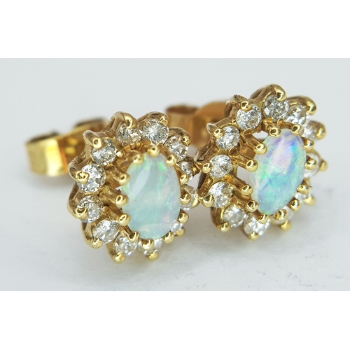 48 - A Pair of 18K Yellow Gold (tested), Diamond and Opal Set, Stud Earrings. 2.7g. TAN 2013