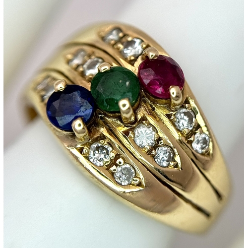 59 - An 18k yellow gold diamond emerald ruby and sapphire ring. 0.12ct diamond weight, 0.04ct emerald wei... 