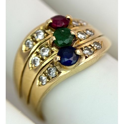 59 - An 18k yellow gold diamond emerald ruby and sapphire ring. 0.12ct diamond weight, 0.04ct emerald wei... 