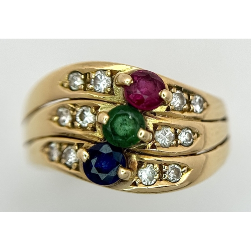 59 - An 18k yellow gold diamond emerald ruby and sapphire ring. 0.12ct diamond weight, 0.04ct emerald wei... 