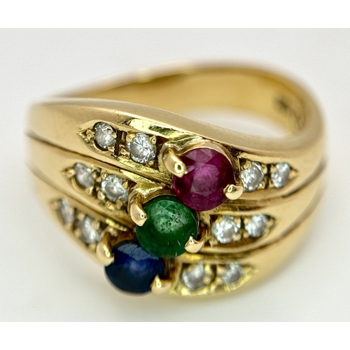 59 - An 18k yellow gold diamond emerald ruby and sapphire ring. 0.12ct diamond weight, 0.04ct emerald wei... 