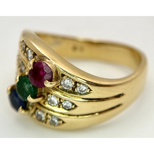 59 - An 18k yellow gold diamond emerald ruby and sapphire ring. 0.12ct diamond weight, 0.04ct emerald wei... 