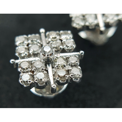 20 - A Pair of 14K White Gold, Diamond Set, Stud Earrings. 1.00ctw. 4.4g. TAN 2004