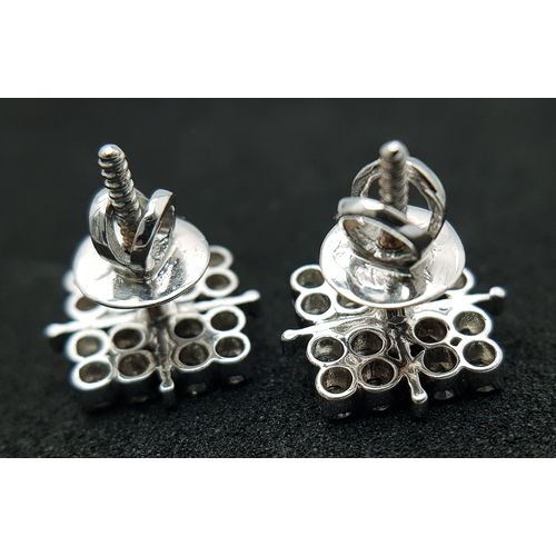 20 - A Pair of 14K White Gold, Diamond Set, Stud Earrings. 1.00ctw. 4.4g. TAN 2004