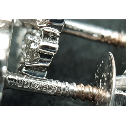20 - A Pair of 14K White Gold, Diamond Set, Stud Earrings. 1.00ctw. 4.4g. TAN 2004