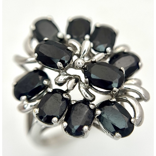 66 - A 14k white gold spinel cluster ring, 5.3g total weight, ring size O. Ref: 2668I.