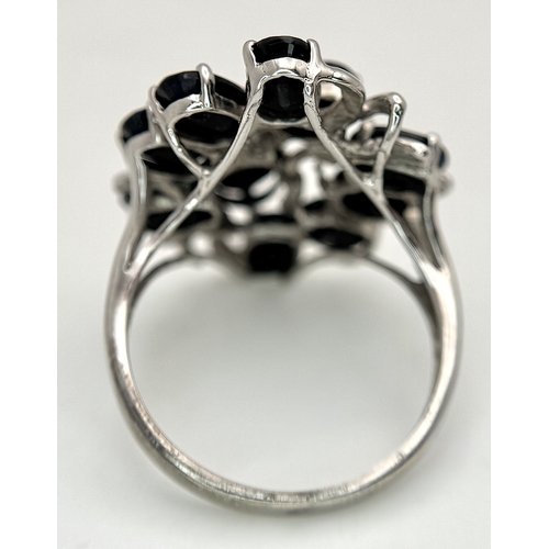 66 - A 14k white gold spinel cluster ring, 5.3g total weight, ring size O. Ref: 2668I.