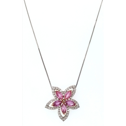 An Italian Designer Picchiotti, Madagascan Sapphire and Diamond Star Form 18K Gold Pendant. 3ctw of marquise cut, natural non-treated sapphires - with a 1ctw round brilliant cut diamond surround of F-G colour and VS2-SI1 clarity. Pendant circa 25 x 25mm. 14K Gold Chain - 42cm. 9.19g total weight. Comes with a W.G.I certificate.