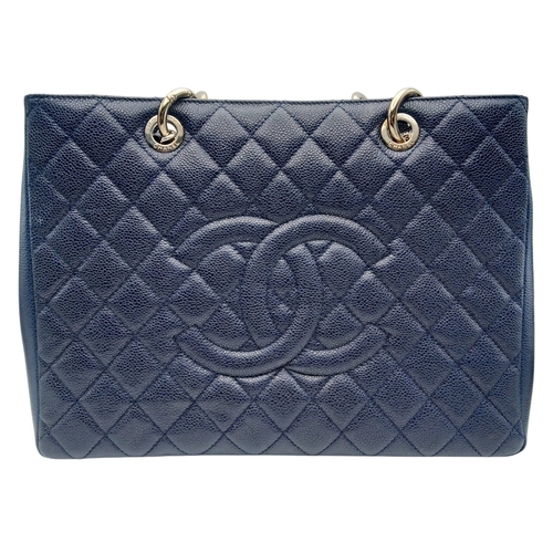 5 - A Navy Blue Chanel Grand Shopping Tote (GST) Bag. Navy Blue quilted caviar leather exterior with sil... 
