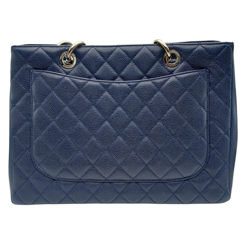 5 - A Navy Blue Chanel Grand Shopping Tote (GST) Bag. Navy Blue quilted caviar leather exterior with sil... 