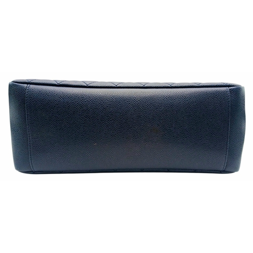 5 - A Navy Blue Chanel Grand Shopping Tote (GST) Bag. Navy Blue quilted caviar leather exterior with sil... 