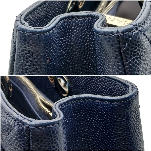 5 - A Navy Blue Chanel Grand Shopping Tote (GST) Bag. Navy Blue quilted caviar leather exterior with sil... 