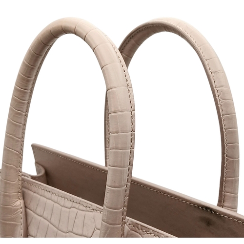 54 - A Baby Pink Saint Laurent Sac de Jour Handbag. Baby pink crocodile-embossed leather exterior with si... 