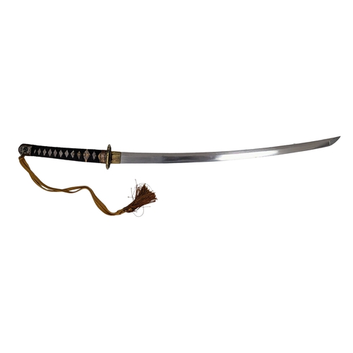 99 - WW2 Japanese Officers Katana Sword. Complete with knot and leather scabbard cover. A bring back from... 