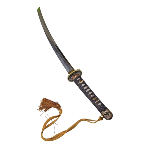 99 - WW2 Japanese Officers Katana Sword. Complete with knot and leather scabbard cover. A bring back from... 