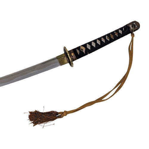 99 - WW2 Japanese Officers Katana Sword. Complete with knot and leather scabbard cover. A bring back from... 