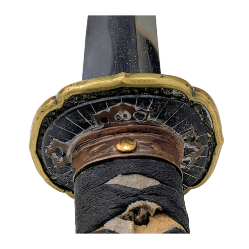 99 - WW2 Japanese Officers Katana Sword. Complete with knot and leather scabbard cover. A bring back from... 