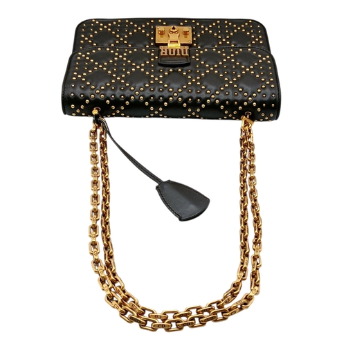 39 - A Christian Dior Lambskin Cannage Studded Large Dioraddict Flap Bag. Black lambskin leather exterior... 