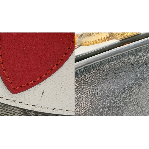 40 - A Gucci GG Supreme Fox Head Bamboo Handle Handbag. Beige GG Supreme canvas exterior with black, whit... 