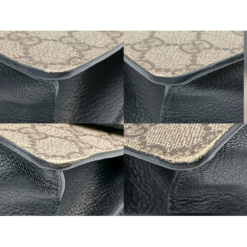40 - A Gucci GG Supreme Fox Head Bamboo Handle Handbag. Beige GG Supreme canvas exterior with black, whit... 