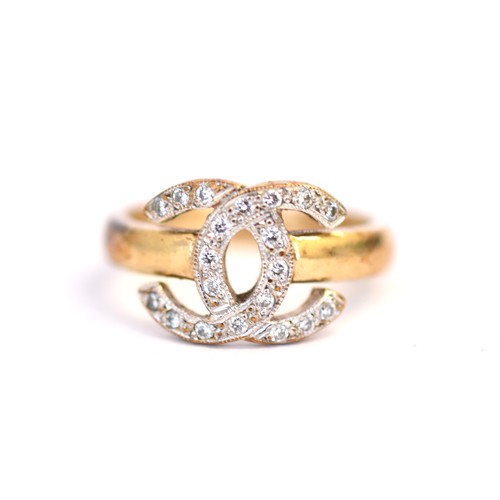 134 - 9ct CC diamond ring. Ring size M. Weighing 3.90g. Head measures 10.20mm. Good condition - tarnish to... 