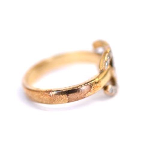 134 - 9ct CC diamond ring. Ring size M. Weighing 3.90g. Head measures 10.20mm. Good condition - tarnish to... 