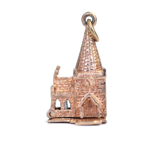131 - Vintage 9ct opening church charm. Measuring 11.70 x 22.50mm. Weighing 3.70g. Good condition.